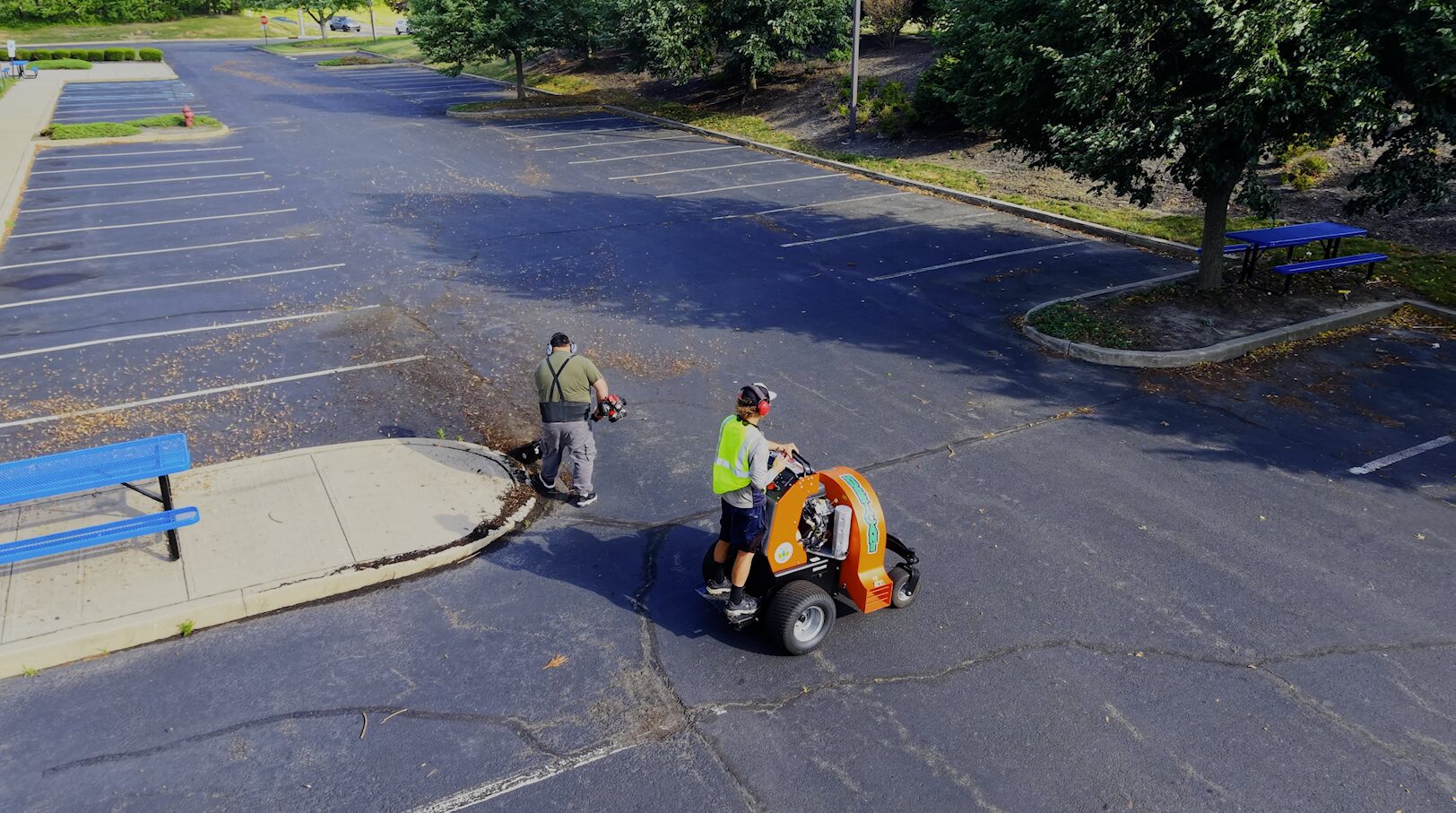 Cleaning parking lot surface before line striping