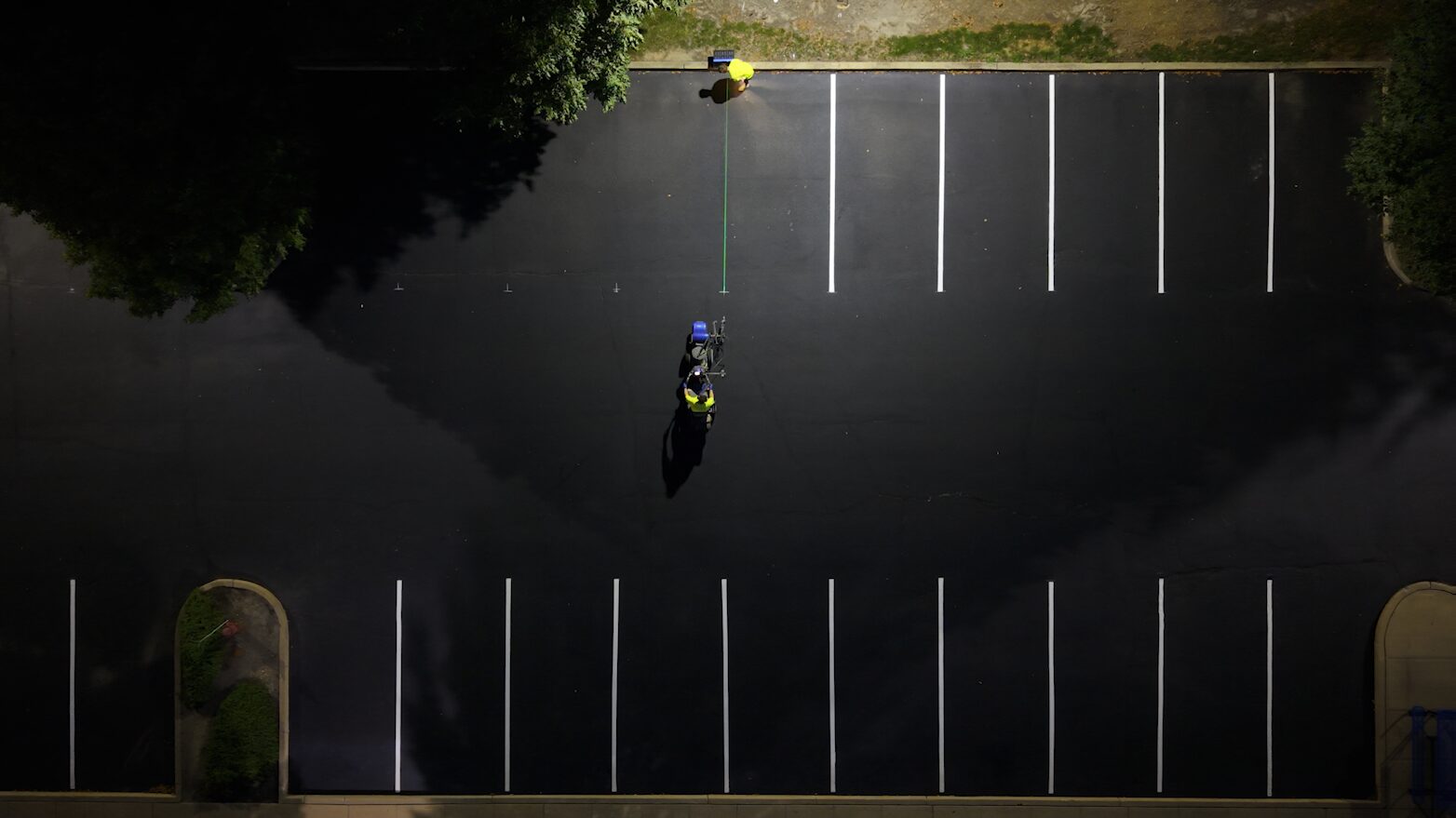 Laser-guided parking lot layout and measurement